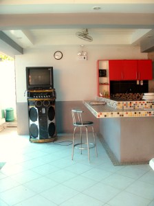 The videoke and kitchen area.